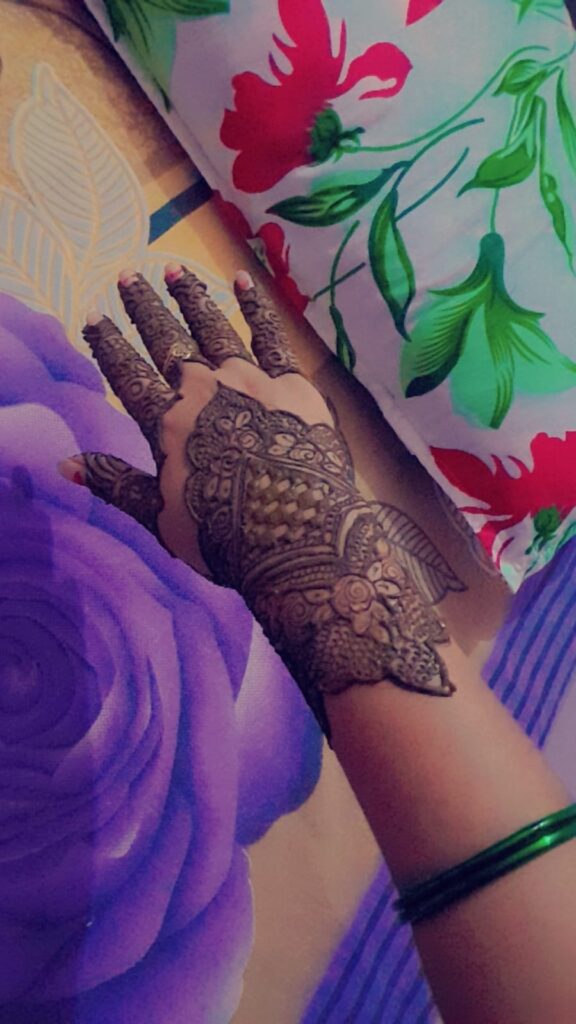 10+ New Stylish Mehndi Designs for Hartalika Teej 2025 6 Symbolizing elegance, this design is always a festive favorite.